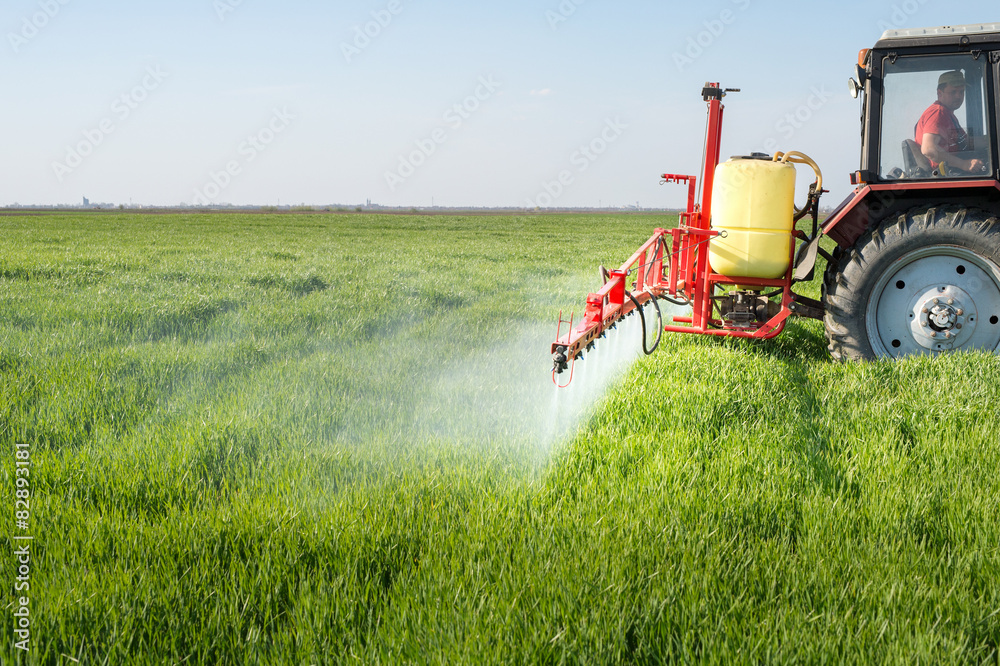 © Dusan Kostic - Tractor spraying wheat field © Dusan Kostic - Tractor spraying wheat field