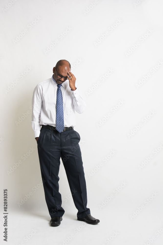 indian male businessman with stressful look indian male businessman with stressful look