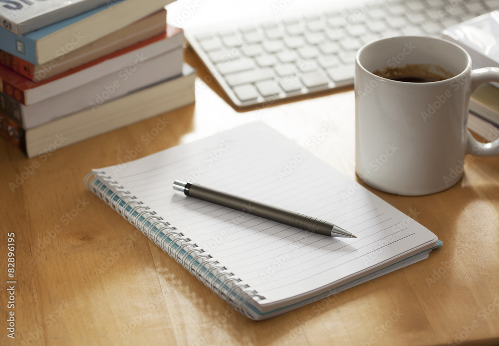 pen with notebook on working table pen with notebook on working table