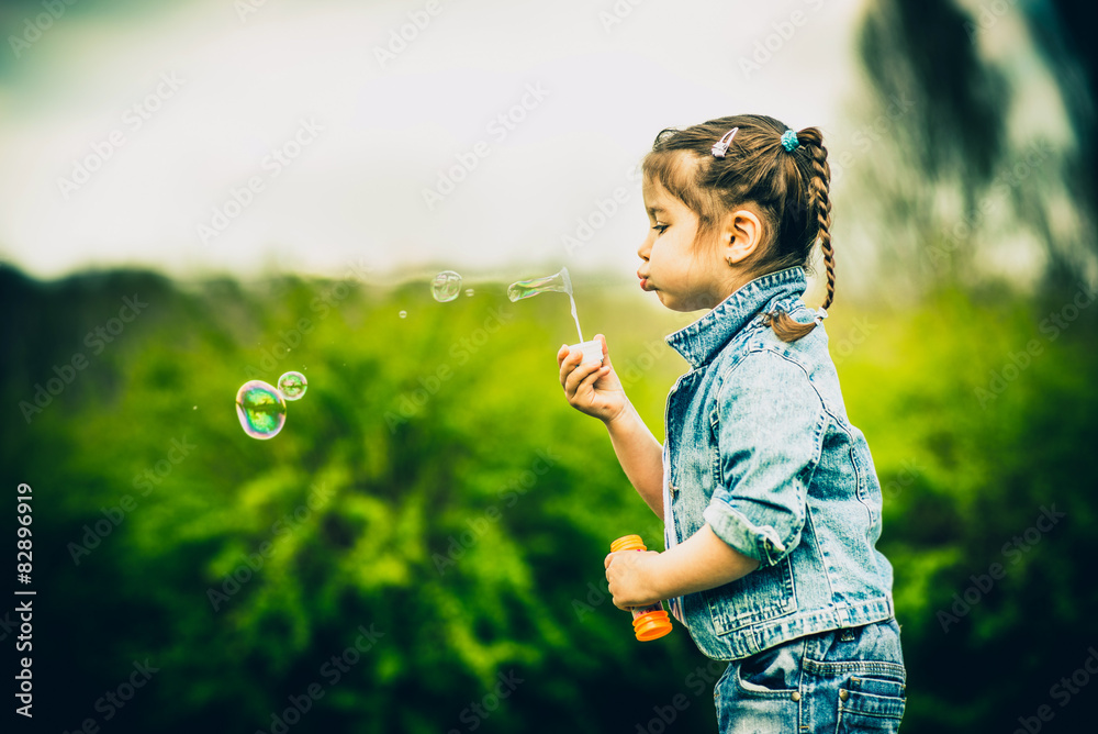 Happy little pretty girl outdoor in the park Happy little pretty girl outdoor in the park