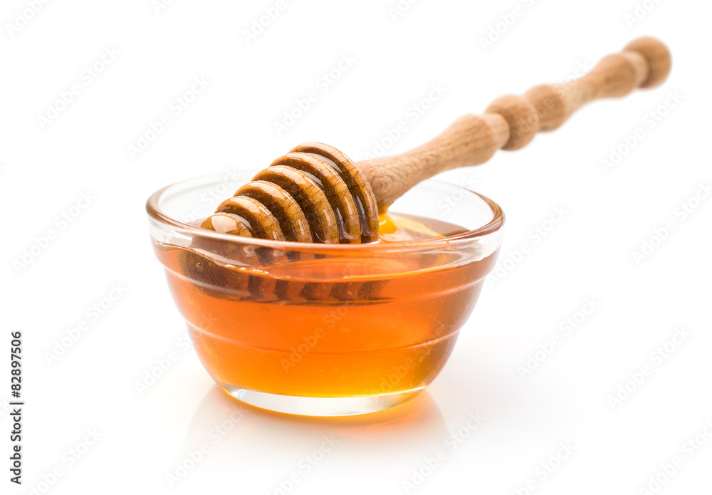 Honey with wooden dipper Honey with wooden dipper