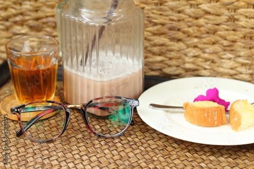 Glasses with bread and tea with ice chocolate