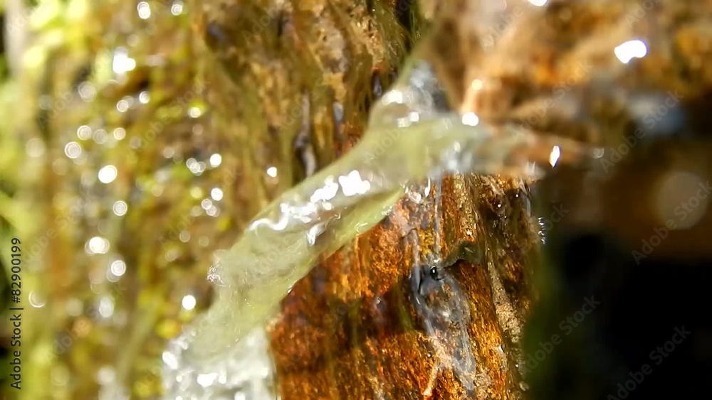 Nature Video - Small water river falling down with drops on rocky mountains Nature Video - Small water river falling down with drops on rocky mountains