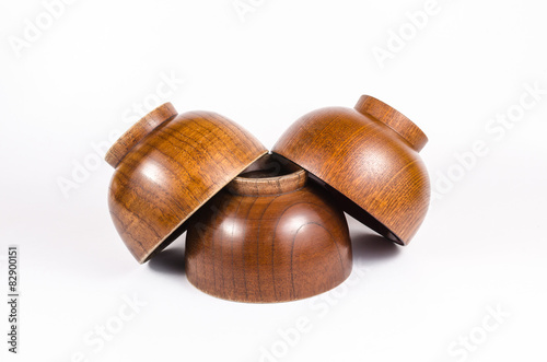 Old wooden bowl isolated on white background