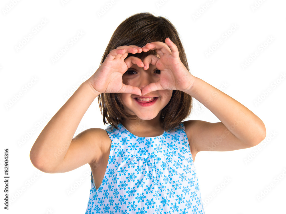 Girl making a heart with her hands Girl making a heart with her hands