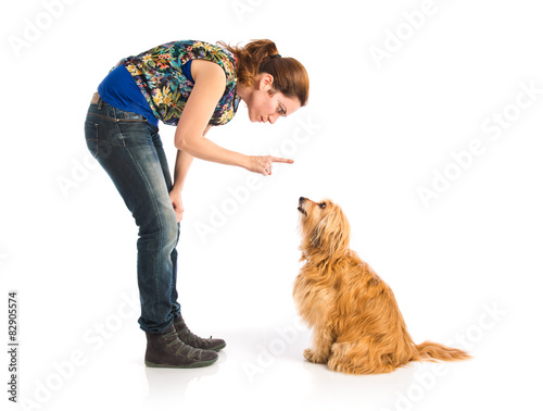 Girl training a dog photo