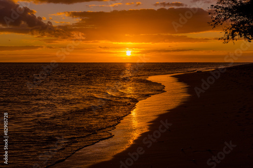 Beautiful sunset on a sandy beach in Mauritius