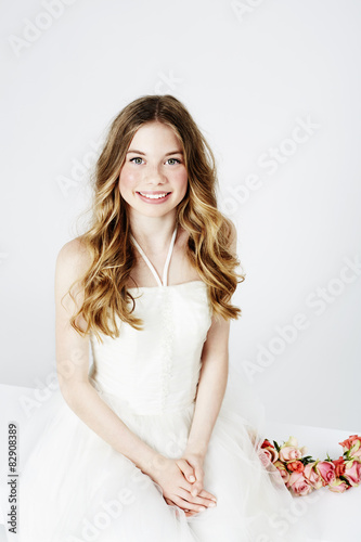 Portrait of teenage flower girl