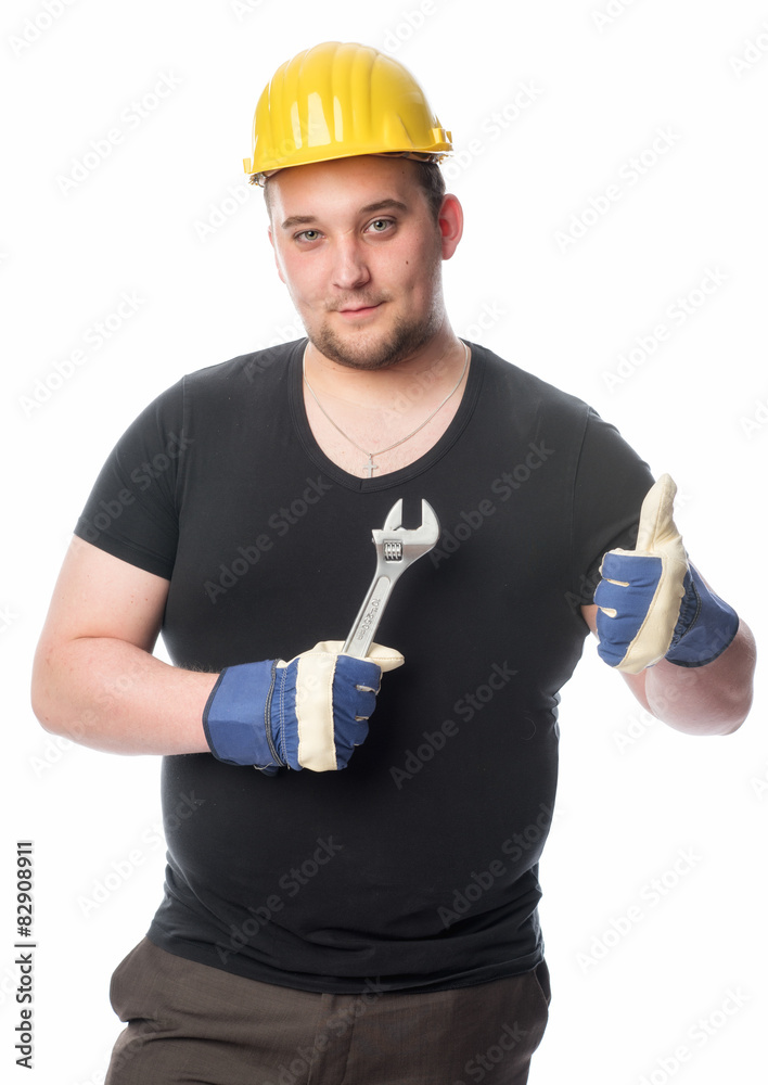 Handwerker mit Schraubenschlüssel zeigt Daumen hoch 
