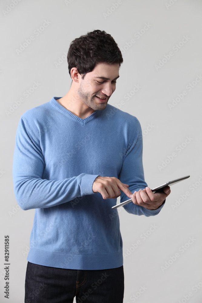 man holding tablet man holding tablet