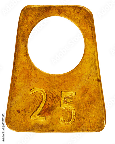 Ancient brass cloakroom label with number 25 photo