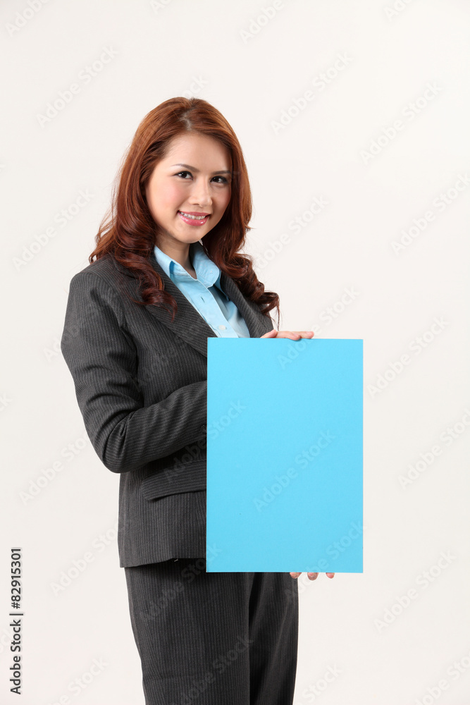 business woman holding a blank blue cardboard business woman holding a blank blue cardboard