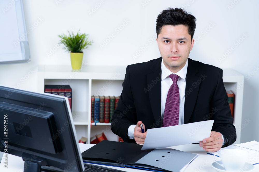 attractive business man in office attractive business man in office