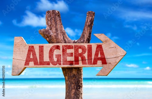 Algeria wooden sign with ocean background