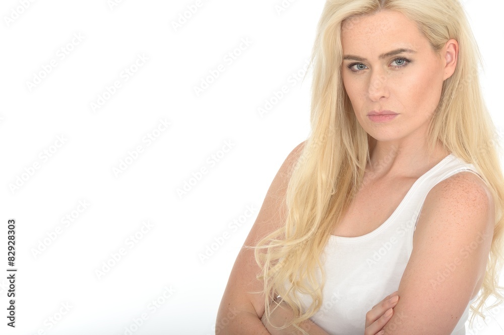 Serious Stern Moody Young Woman Standing With Her Arms Folded Serious Stern Moody Young Woman Standing With Her Arms Folded