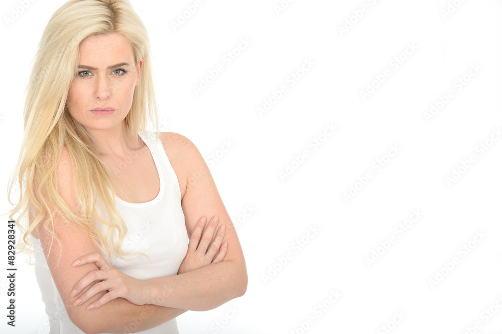Serious Stern Moody Young Woman Standing With Her Arms Folded Serious Stern Moody Young Woman Standing With Her Arms Folded