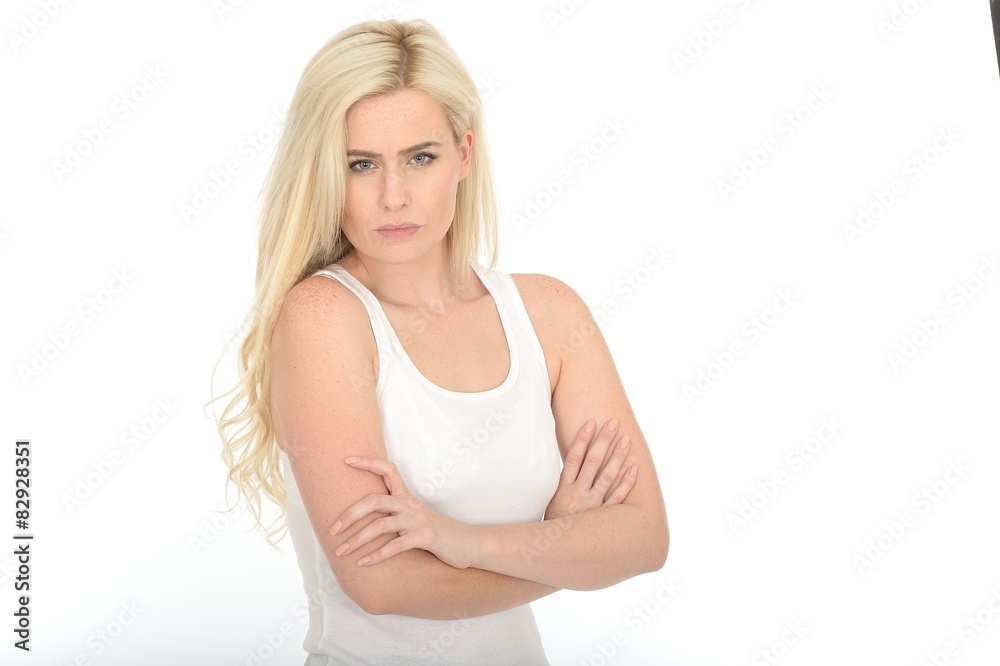 Serious Stern Moody Young Woman Standing With Her Arms Folded Serious Stern Moody Young Woman Standing With Her Arms Folded