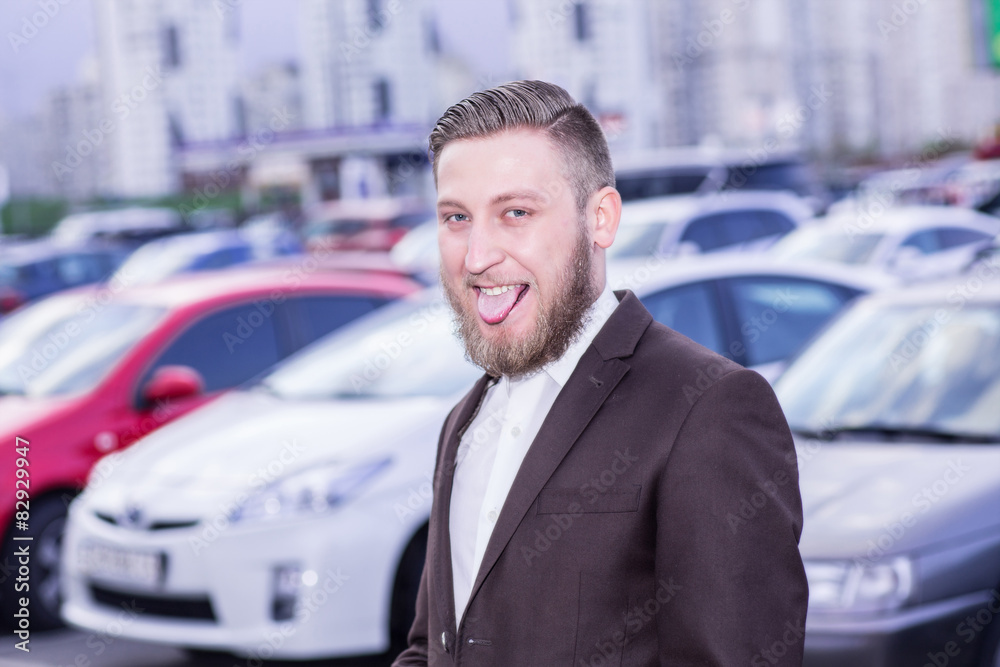 Man sticking her tongue out, car Man sticking her tongue out, car