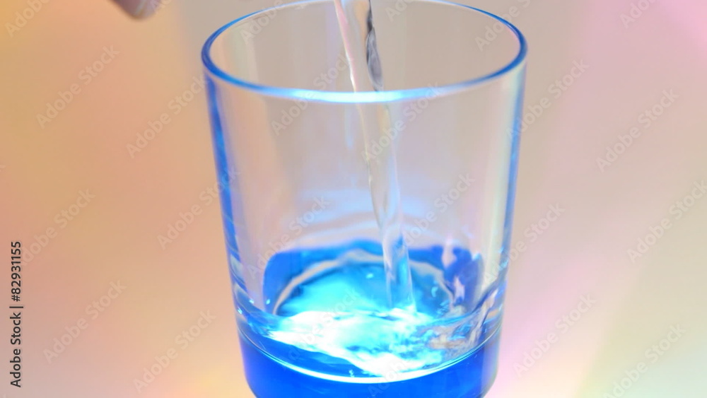 Water was poured into the beaker. Multi colored light