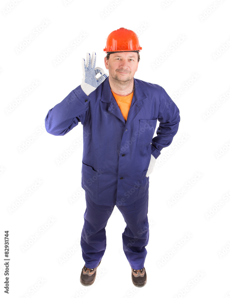 Worker in red protective helmet. Worker in red protective helmet.