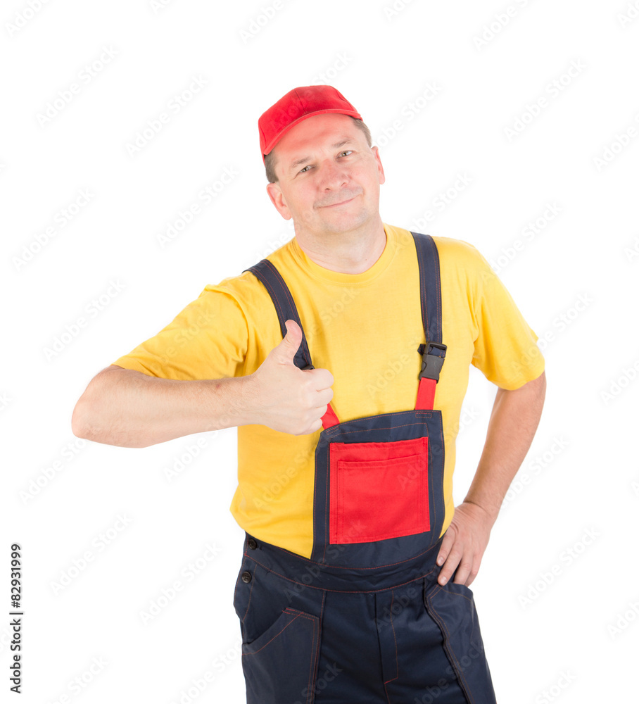 Worker wearing overalls. Worker wearing overalls.