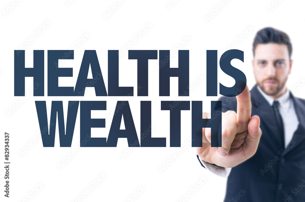 Business man pointing the text: Health is Wealth Business man pointing the text: Health is Wealth