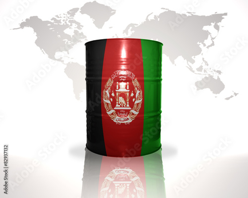 barrel with afghan flag on the world map background