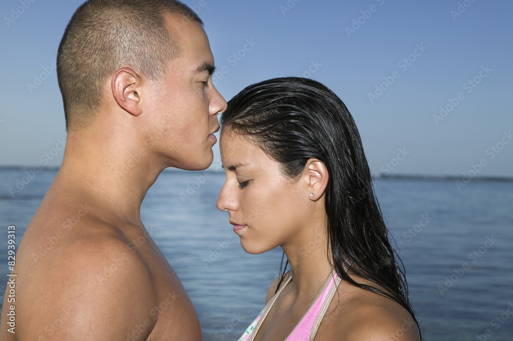 Multi-ethnic couple with eyes closed Multi-ethnic couple with eyes closed