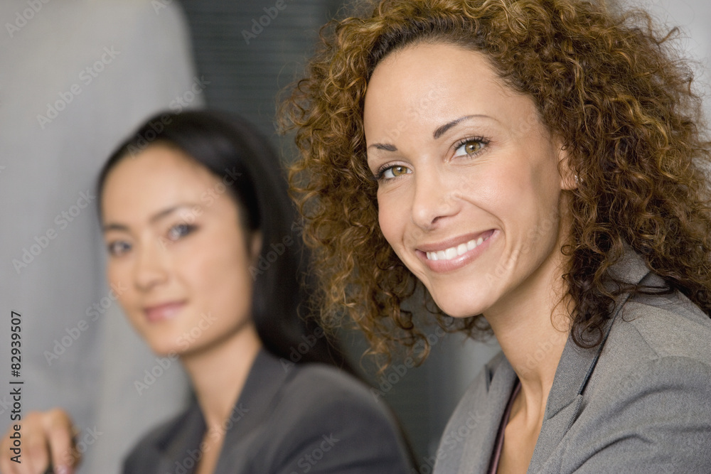 Multi-ethnic businesswomen at meeting Multi-ethnic businesswomen at meeting