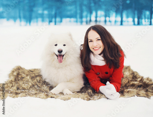 Winter, christmas and people concept - happy woman having fun wi © rohappy