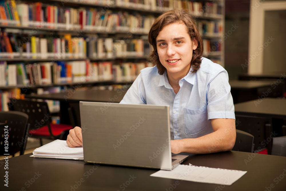 Happy student doing homework Happy student doing homework