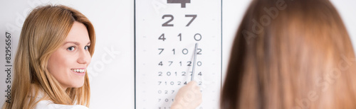 Ophthalmic optician and snellen chart photo