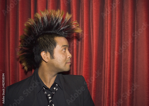 Pacific Islander man with mohawk photo