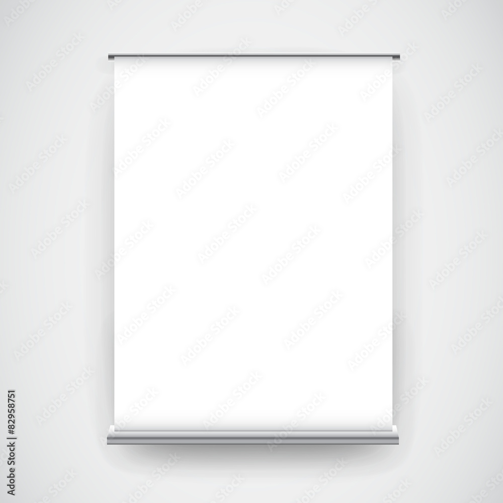 Empty white roll up banner display on wall Empty white roll up banner display on wall