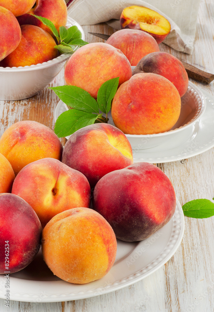 fresh peaches on a wooden table fresh peaches on a wooden table