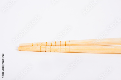 chopsticks on a white paper background