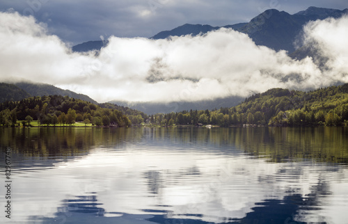 Bohinj lake with morning fog shrouded, panorama