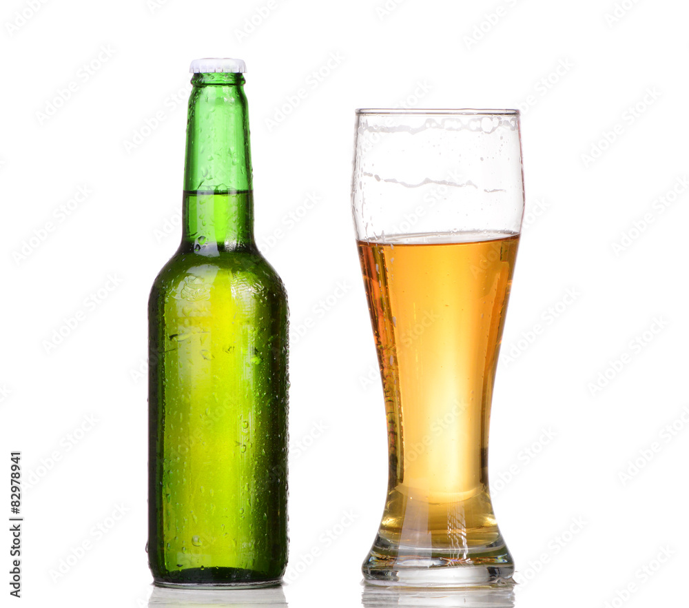 Chilled green bottle with condensate and a glass of beer lager Chilled green bottle with condensate and a glass of beer lager