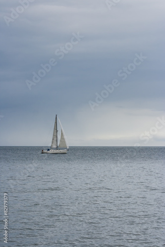 Sailing boat at an open sea