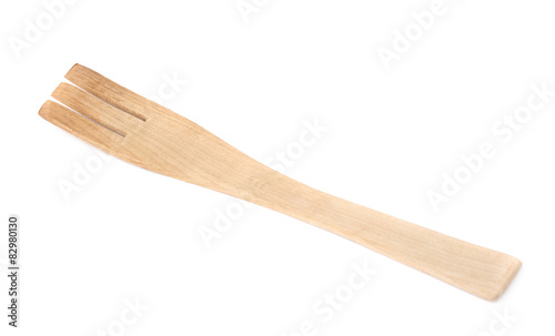 Used wooden fork spatula isolated