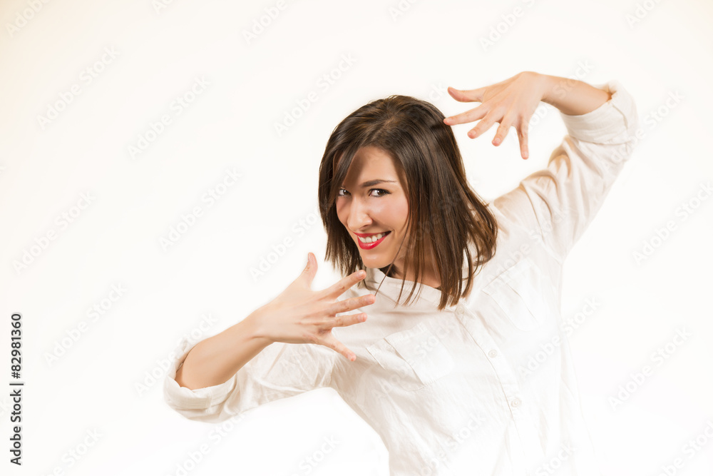 Expressive portrait of a brunette girl in studio on white Expressive portrait of a brunette girl in studio on white