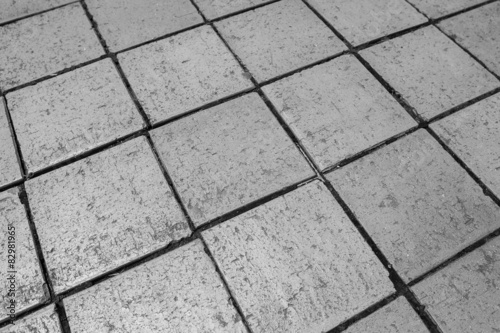 Black and white tiles give a harmonic pattern at the ground