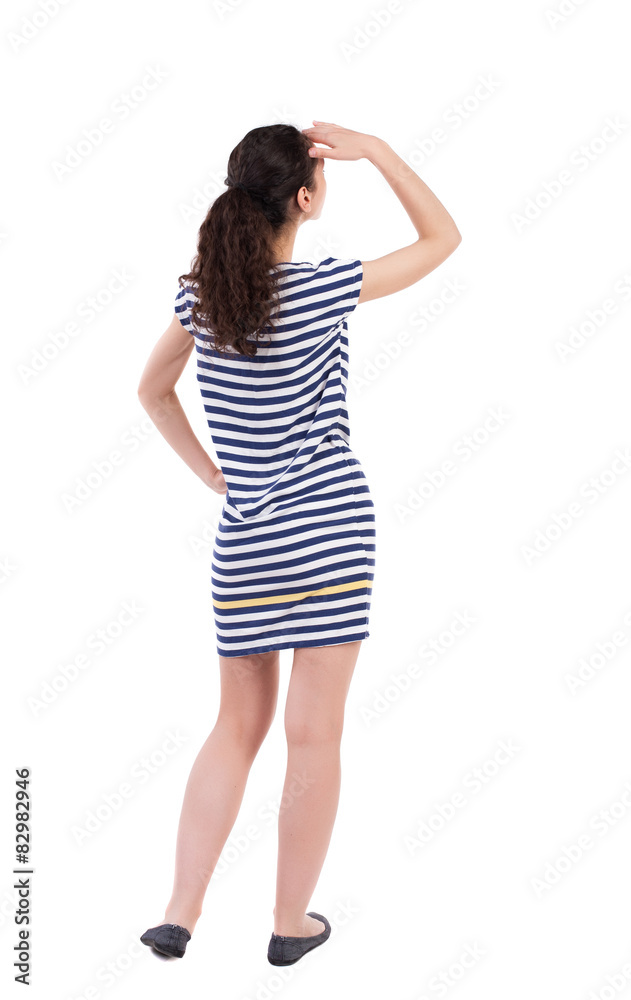 back view of standing young beautiful woman. back view of standing young beautiful woman.