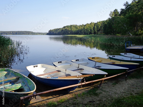 Boats at the berth on the shore of the river