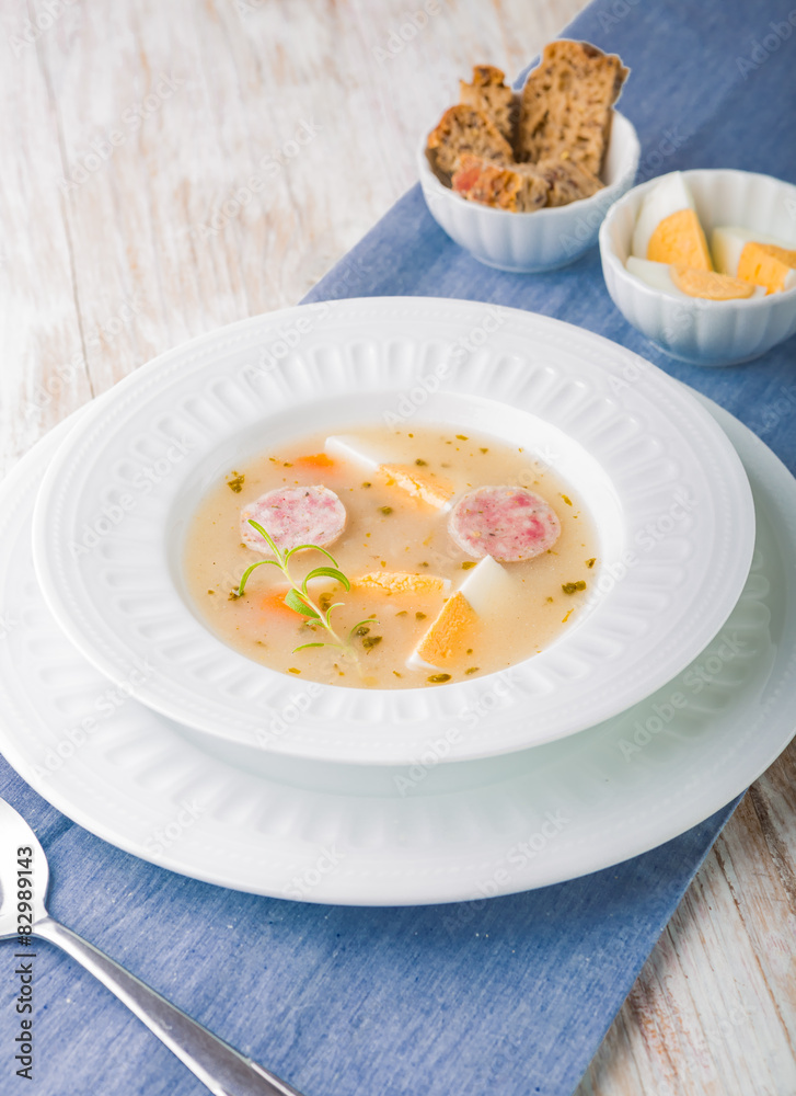 Borscht with eggs and white sausage.(Polish easter soup) Borscht with eggs and white sausage.(Polish easter soup)