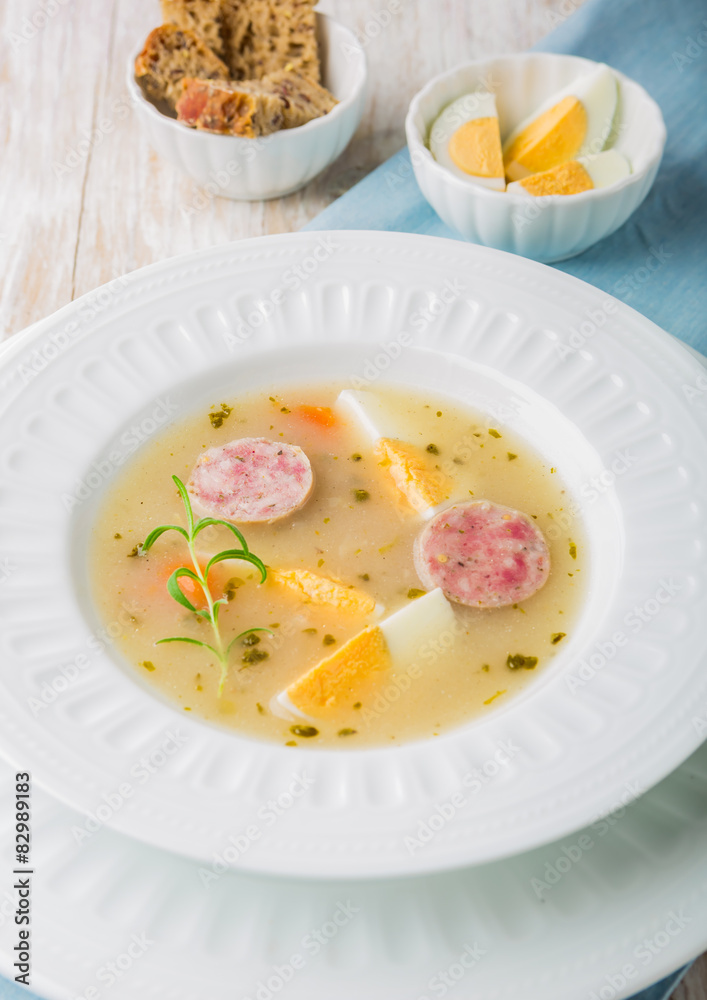 Borscht with eggs and white sausage.(Polish easter soup) Borscht with eggs and white sausage.(Polish easter soup)