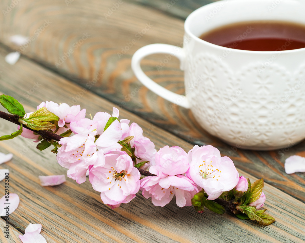 Cup of tea and sakura blossom