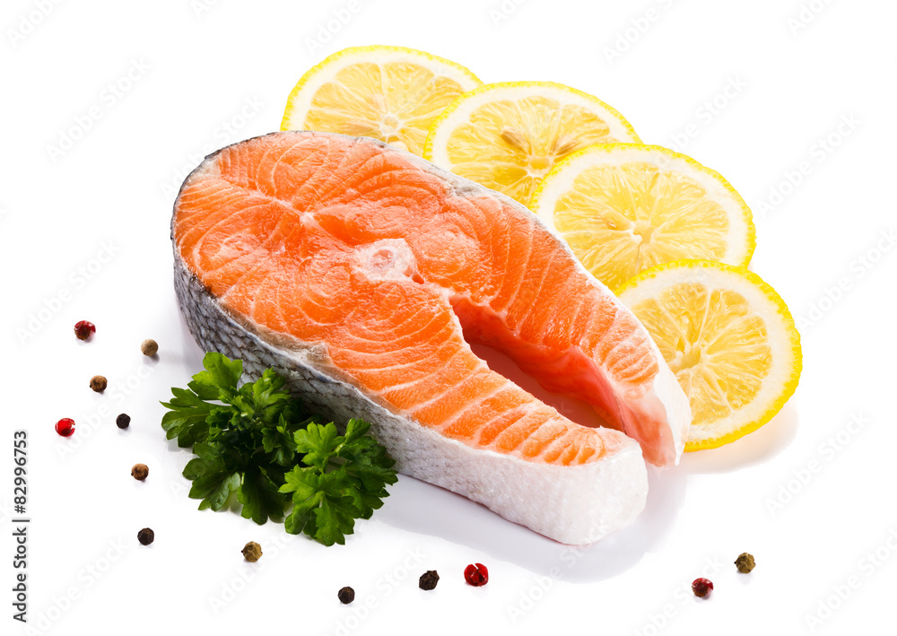 Fresh raw salmon fillet on white background