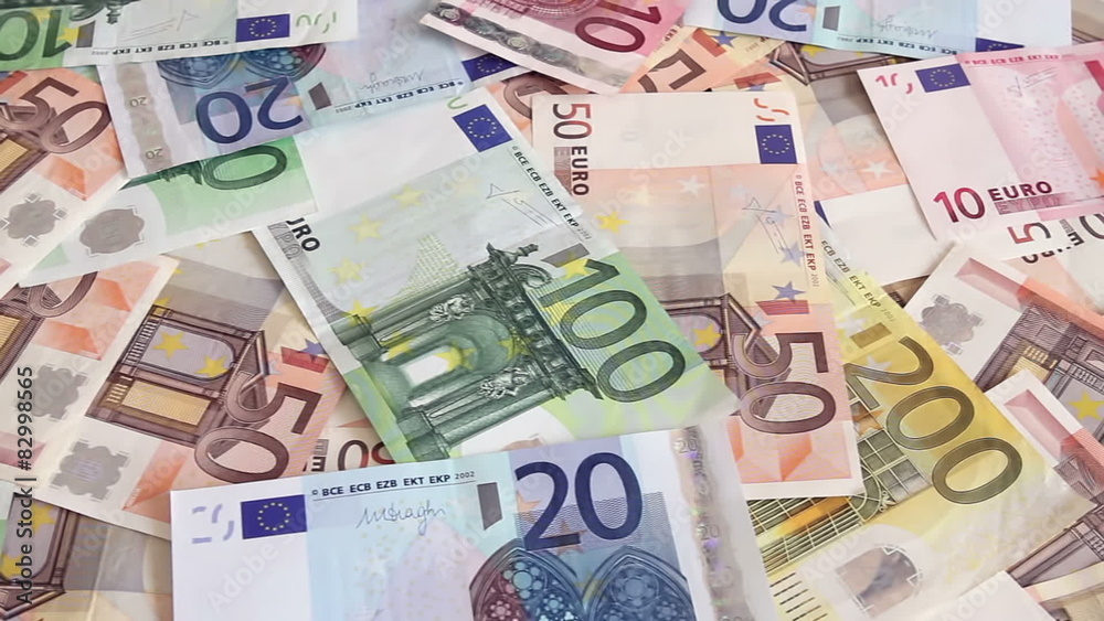 Camera closely tracking over a plane filled with euro bills. Camera closely tracking over a plane filled with euro bills.