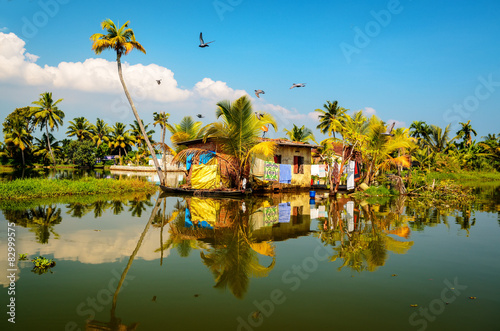 Traditional local house in backwaters of Kerala photo